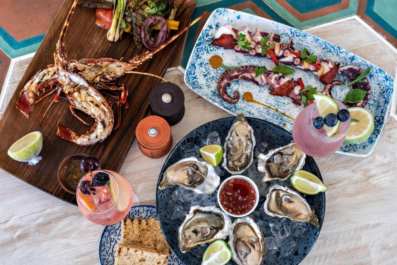 حياة بالاس تغازوت باي المظهر الخارجي الصورة Seafood at the restaurant