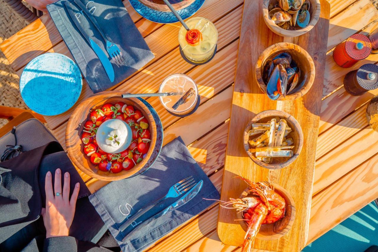 حياة بالاس تغازوت باي المظهر الخارجي الصورة A selection of tapas